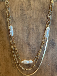 Gold Multi Chain Oval Pearl Necklace