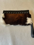 Hair on leather Wristlet