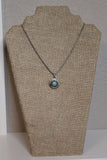 Sterling silver textured dome pendant with turquoise stone