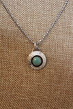 Sterling silver textured dome pendant with turquoise stone
